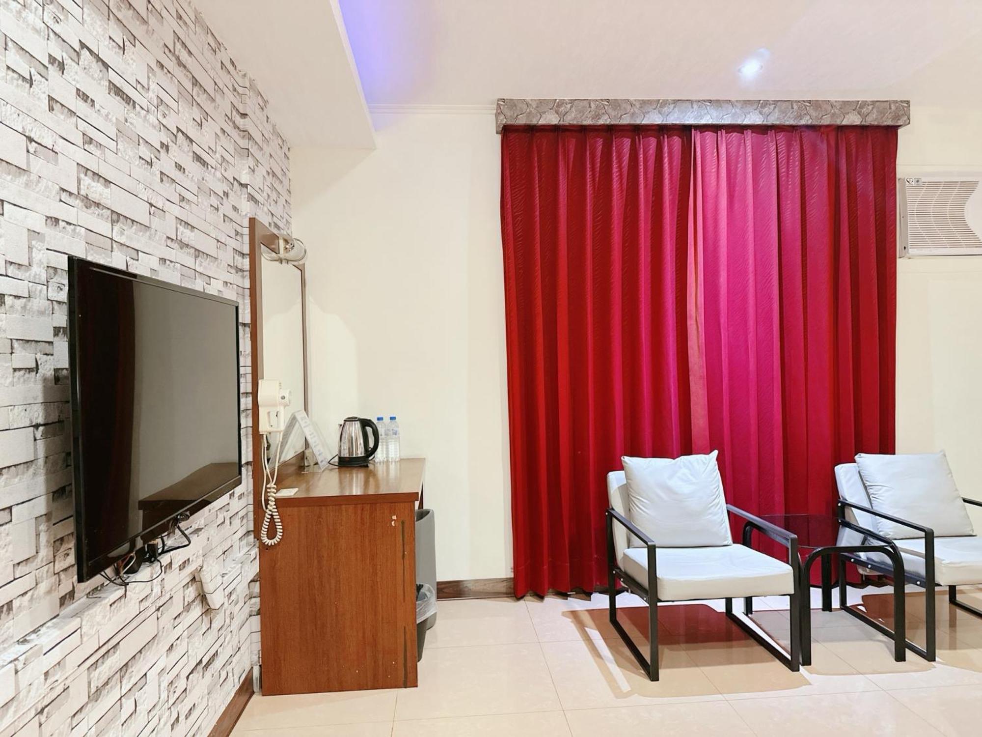 Hua Du Motel Jiji Bagian luar foto